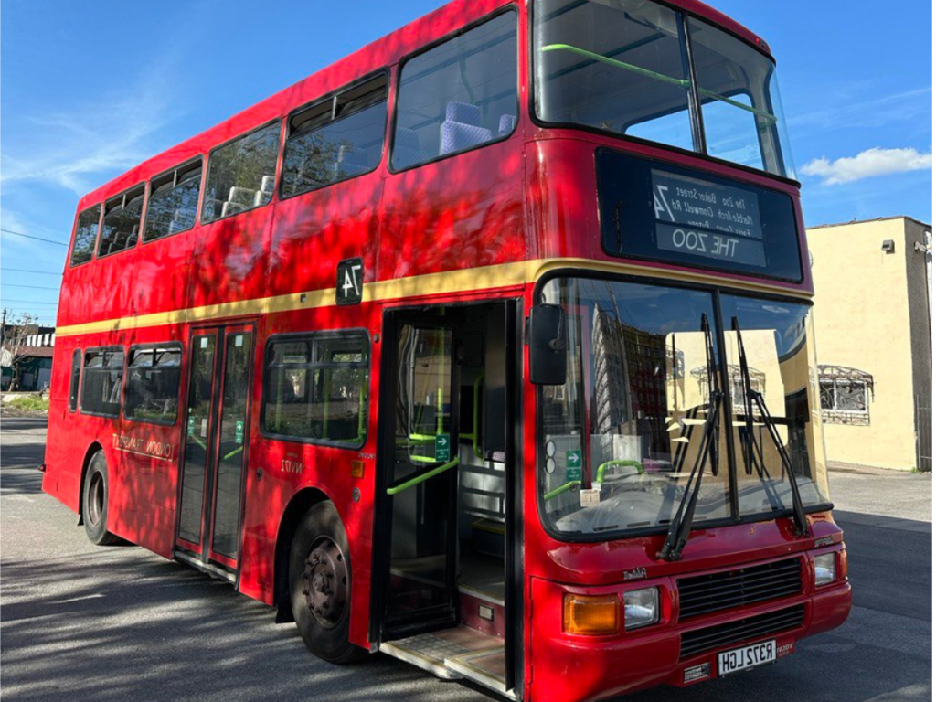 A photo of Double Decker Bus being converted into a cafeteria in Park City Utah.