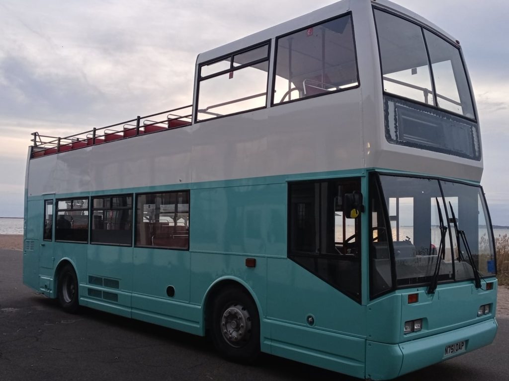 Photo of a double decker with no roof, converted into a Mobile photo venue. New Haven Connecticut